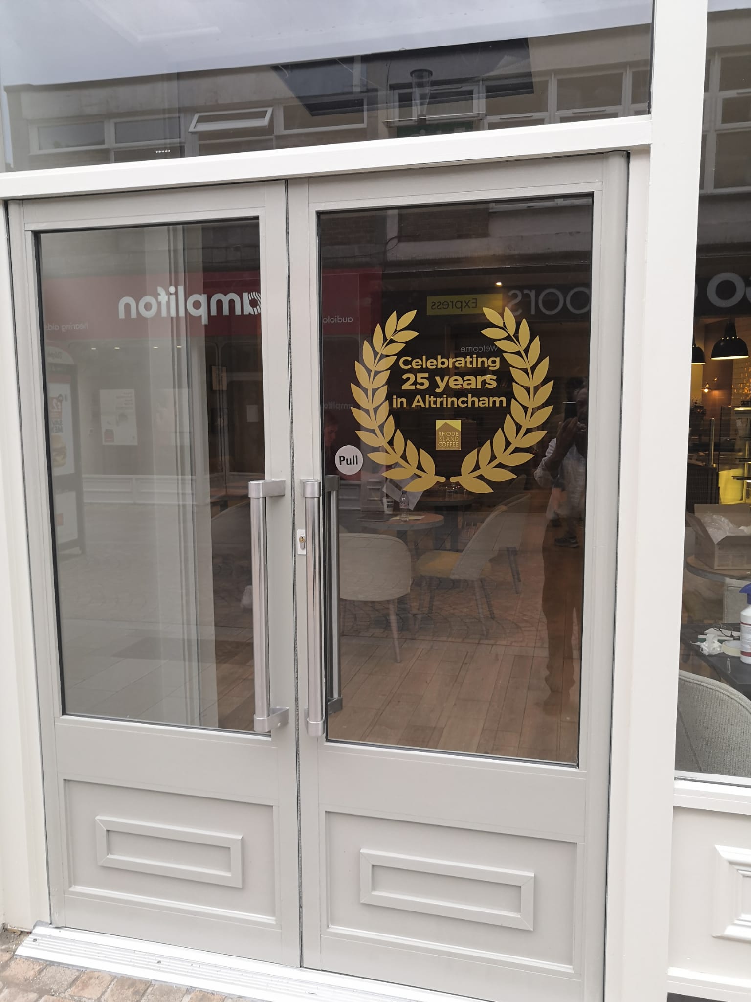 Exterior shop frontage branding designed to improve kerb appeal and visibility